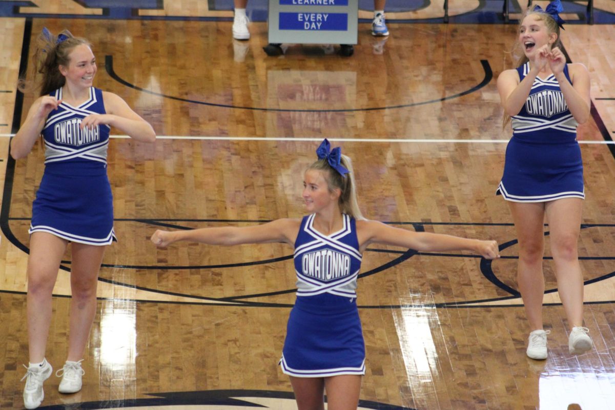 Owatonna cheerleaders enjoying cheering to kick off the show. 