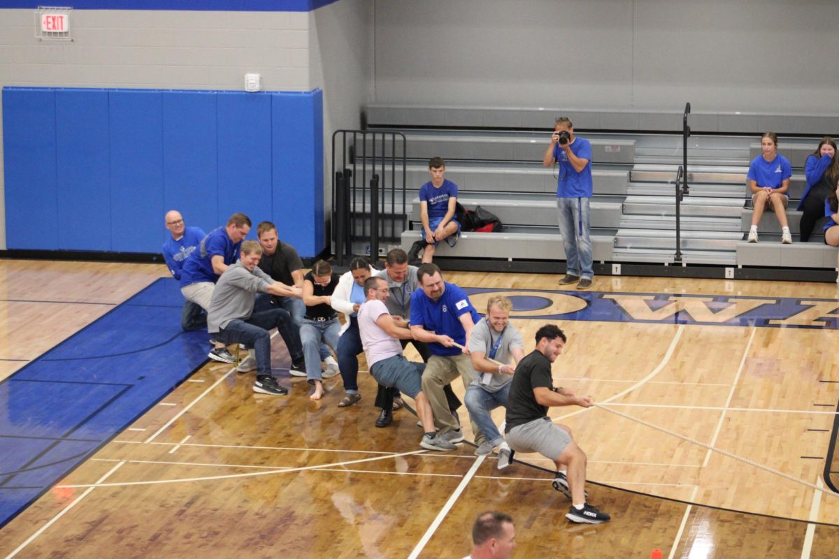 OHS staff members tug their way to victory. 