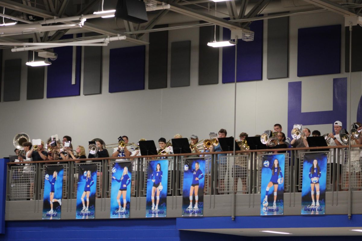 The Owatonna Pep Band playing the school song.
