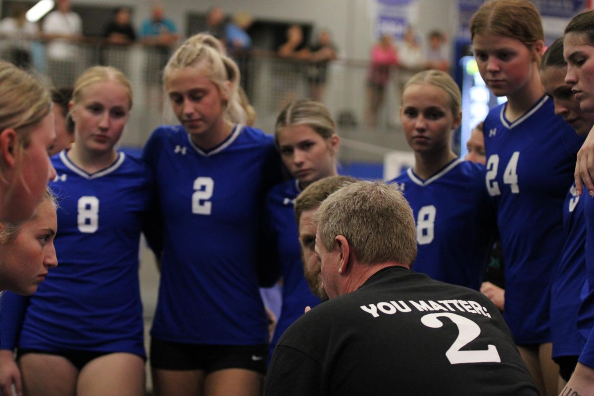 Coach Kaytor speaks to the team during a timeout.