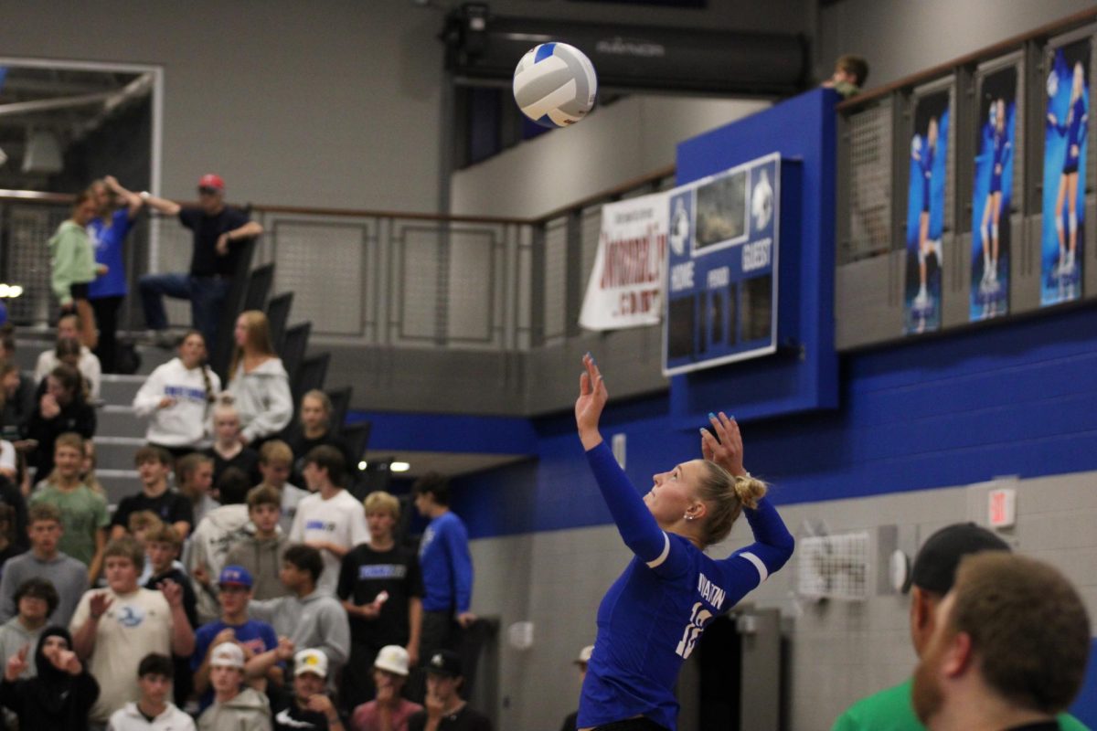 Junior Kendra Bogen looks ahead to set the ball.