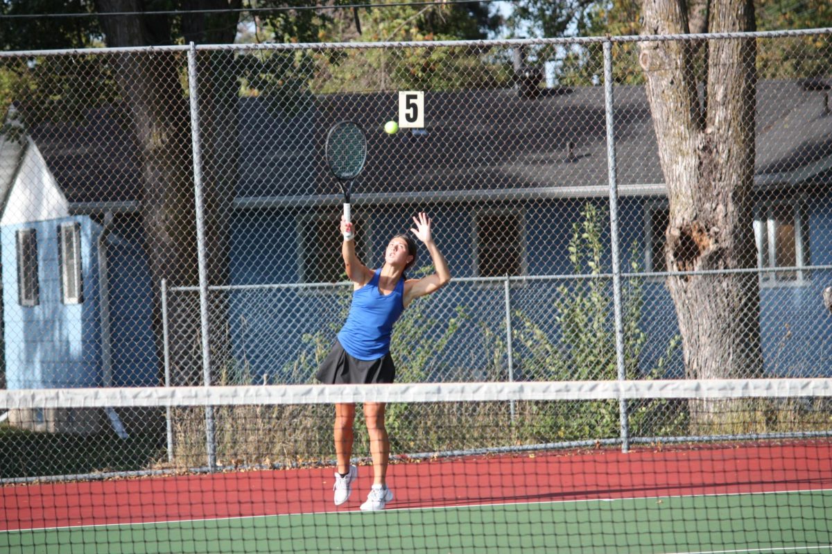 Sophomore Patty Procopio serves the ball to the opponent. 