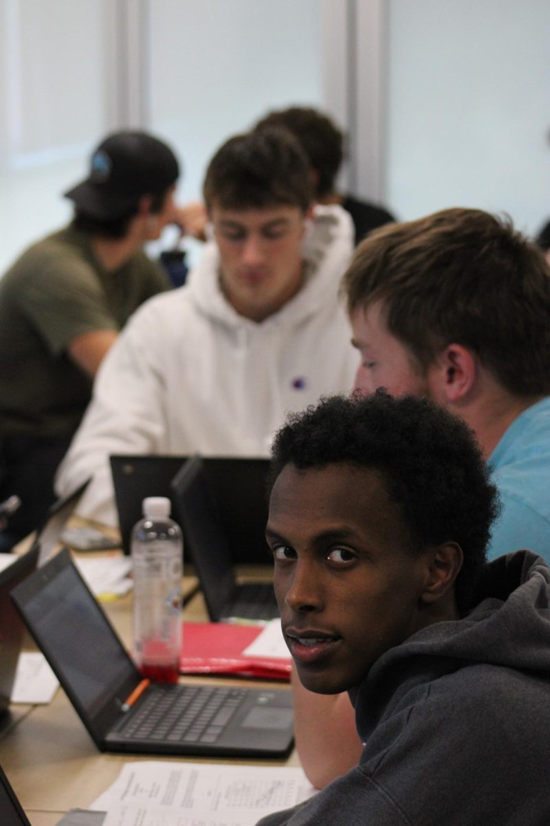 Senior Amin Ismail works in a group for history,