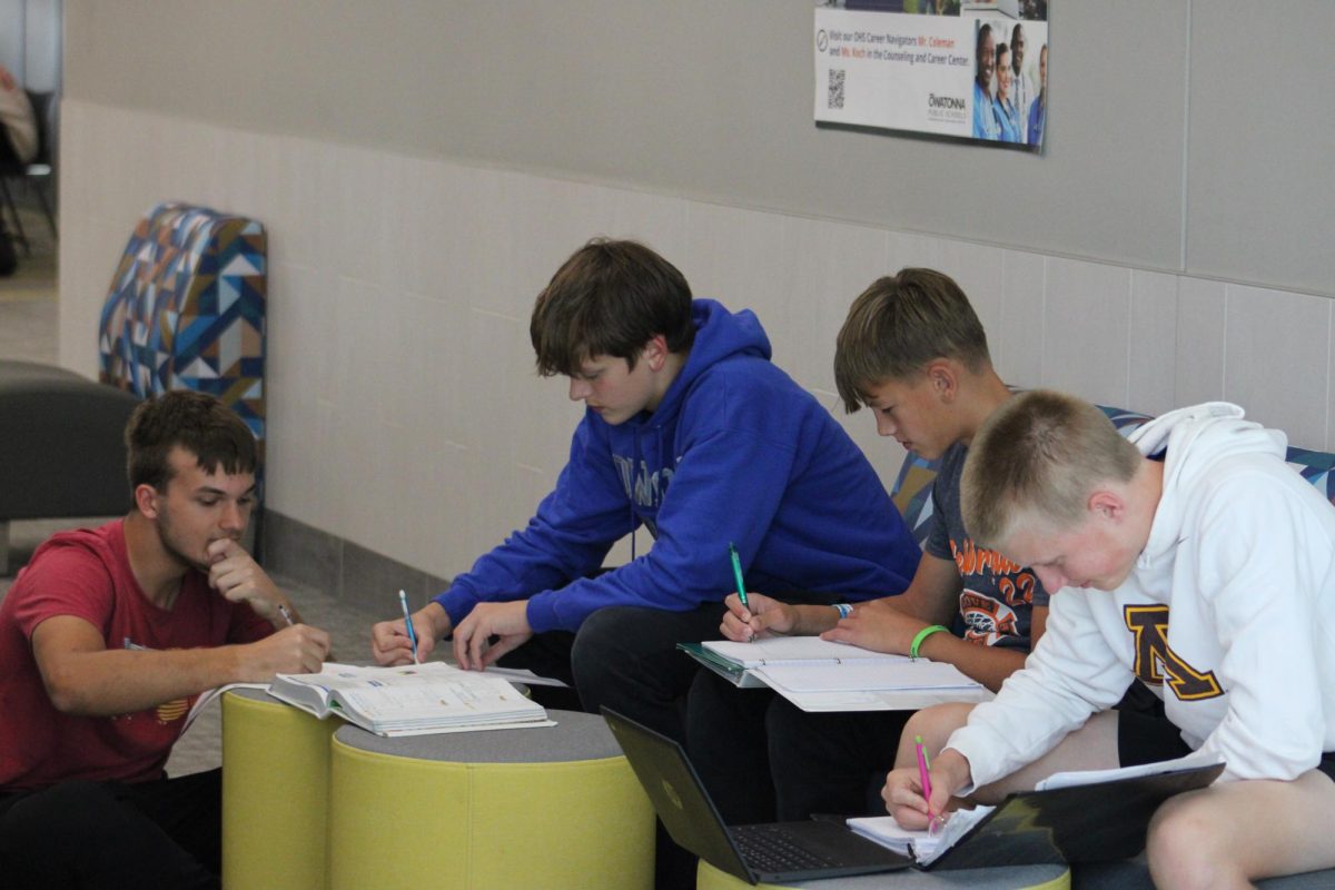 Freshmen Arik Tackmann, Easton Korbel, Joash Packard and Reeve Franko work on their math assignment for the day.