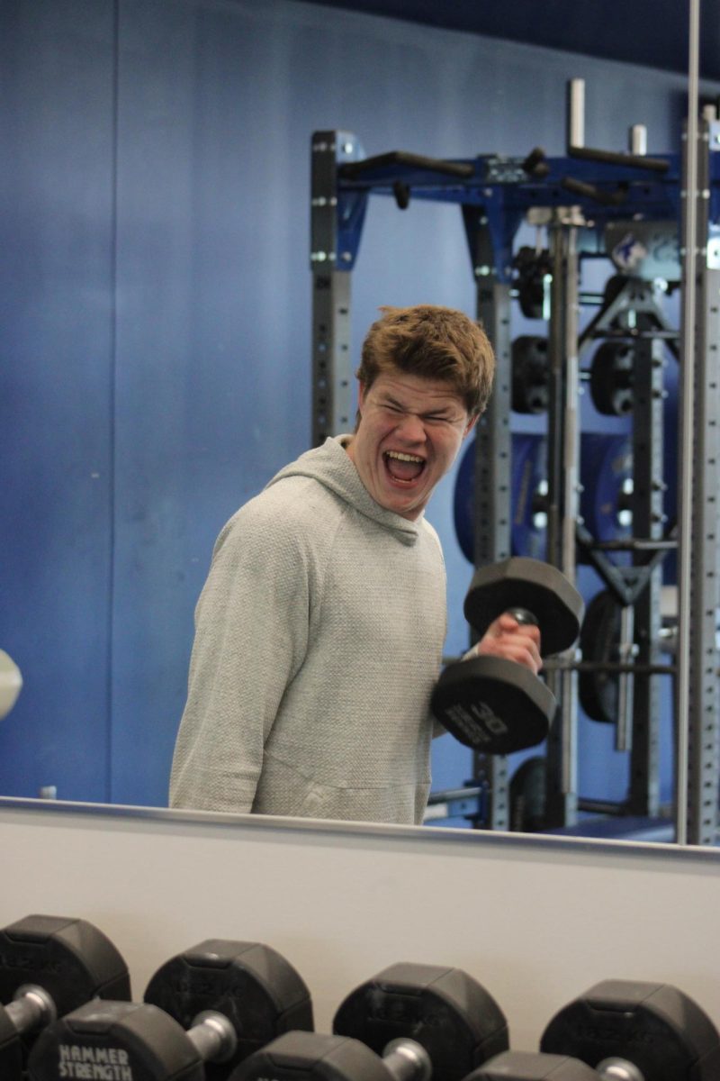 Ryan Mcintosh working hard on his curls.