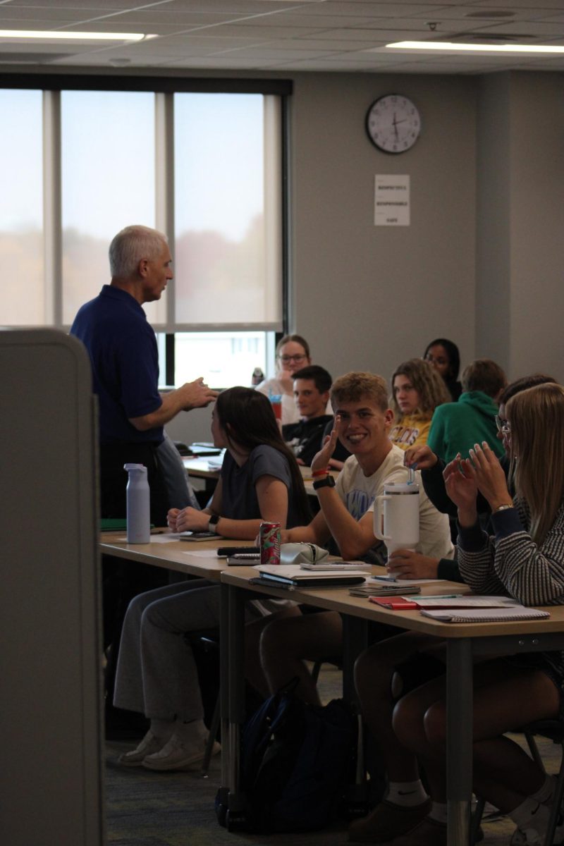 Students trying to focus in Mr. Benson's open classroom.