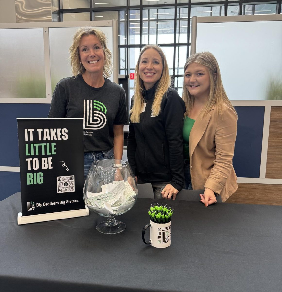 Big Brothers Big Sisters representatives Michelle Redman, Jessica Crotser and Allie Mayer man their booth at OHS lunches.