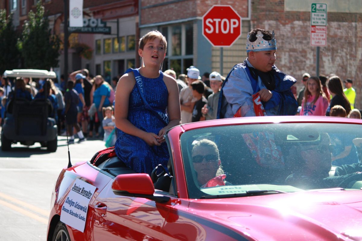 Junior Royalty Evelyn Griswold and Deacon Schroht-Louis look ahead at the parade.