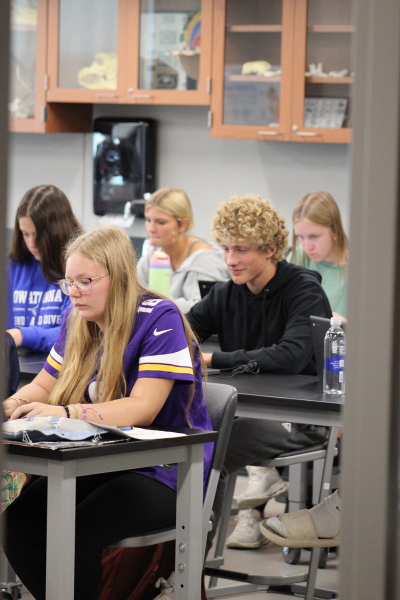 Sophomore Aden Tackman studies in Mr. Will's science class.