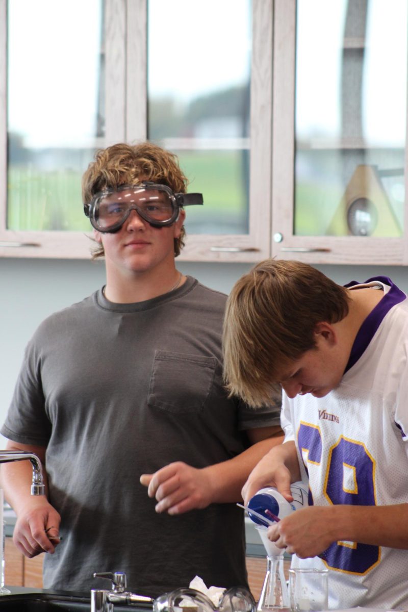 Junior Max Flemke working on a science lab.