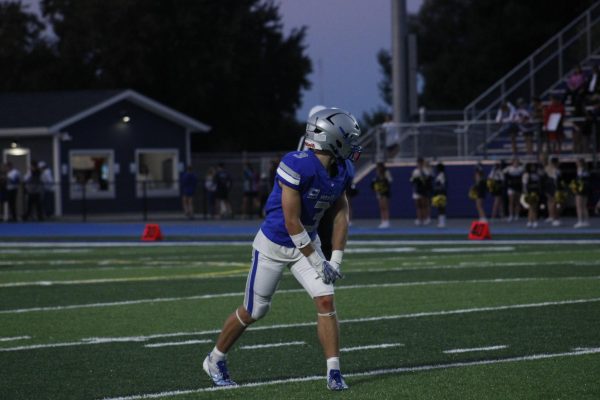 Owatonnas Senior captain Nolan Ginskey lines up and waits for the play to start. 