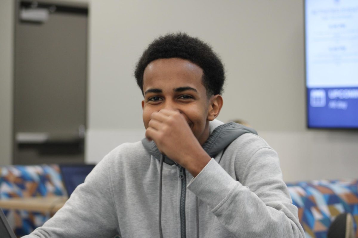 Junior Yahya Dahir is laughing while getting his photo taken.