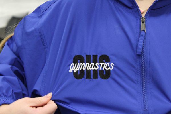 OHS Gymnastics Team represents their new team jackets for the 2024-2025 season.