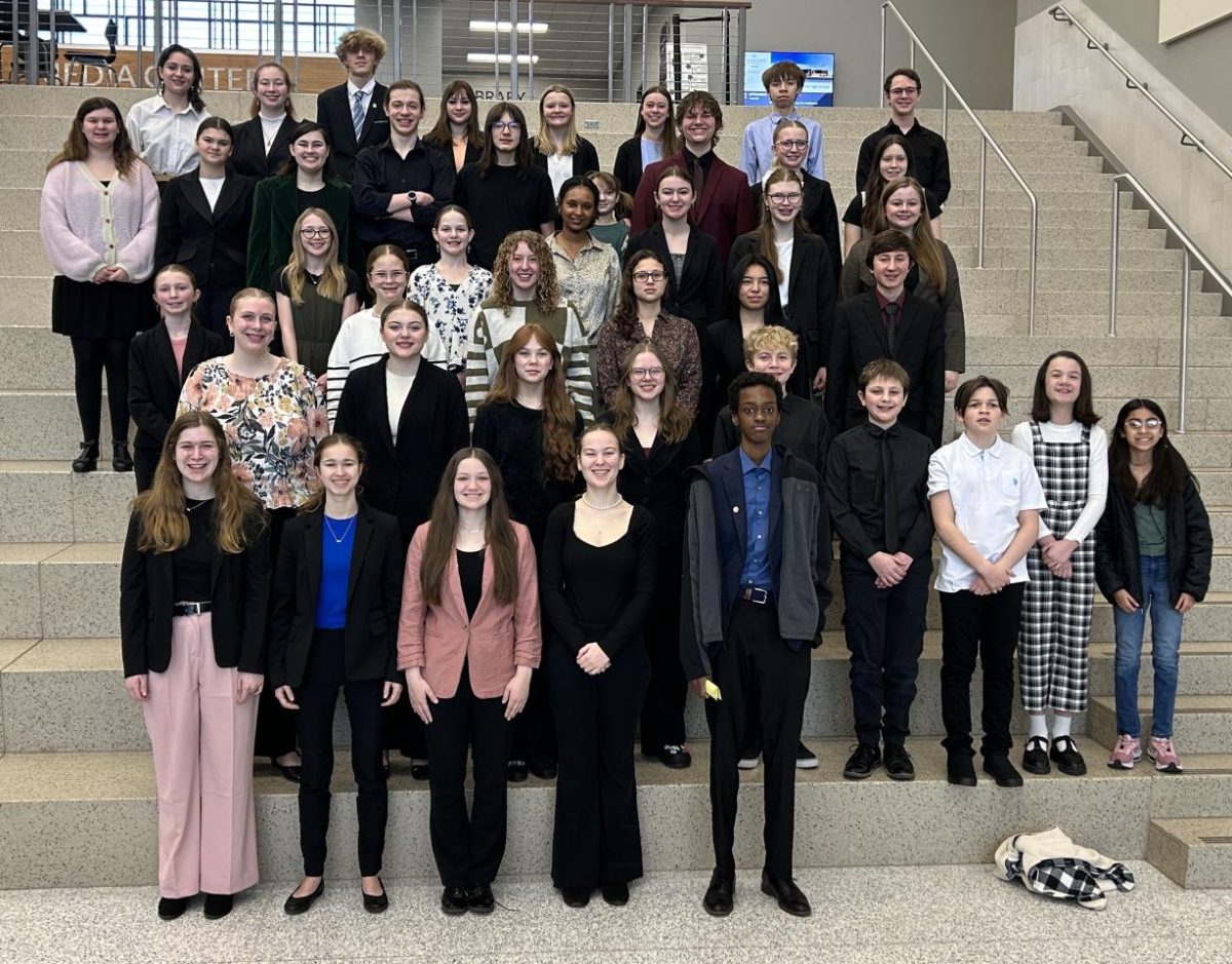 The OHS Speech Team gathers for a picture. They are hosting their conference meet this year.