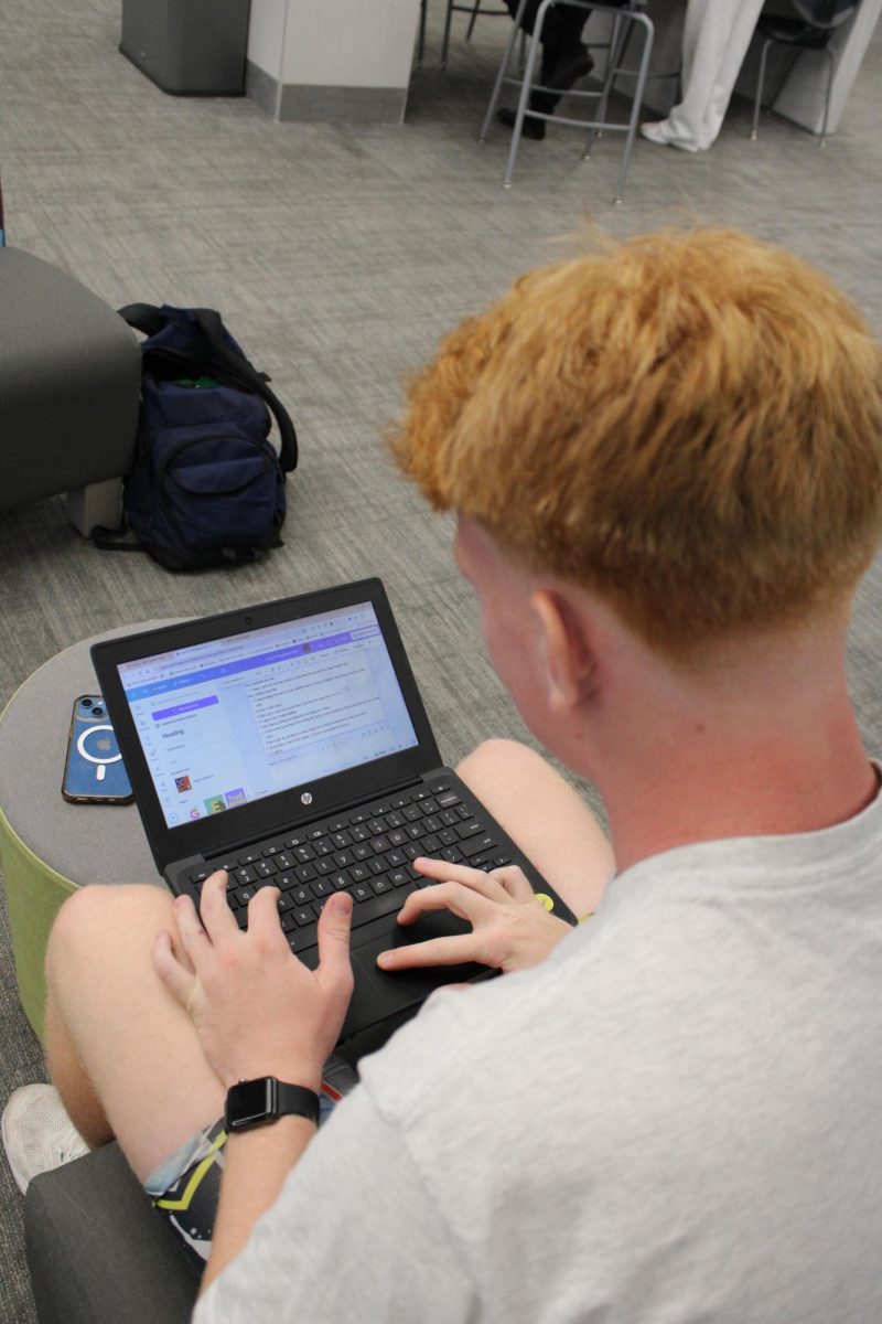 Junior Ben Sackett working on his school work.