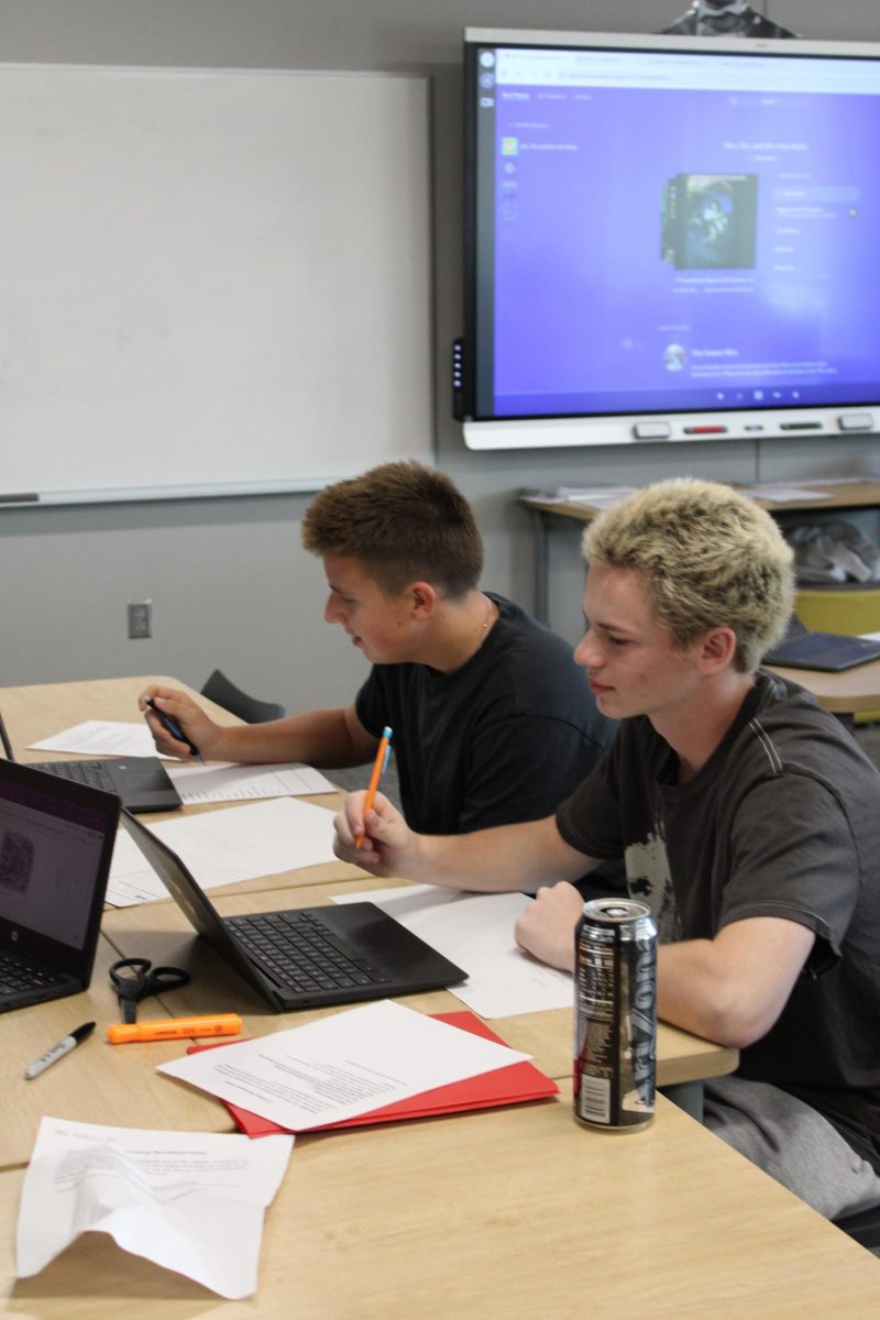 Juniors Owen Kubicek and Jared Laiho doing their history assignments.