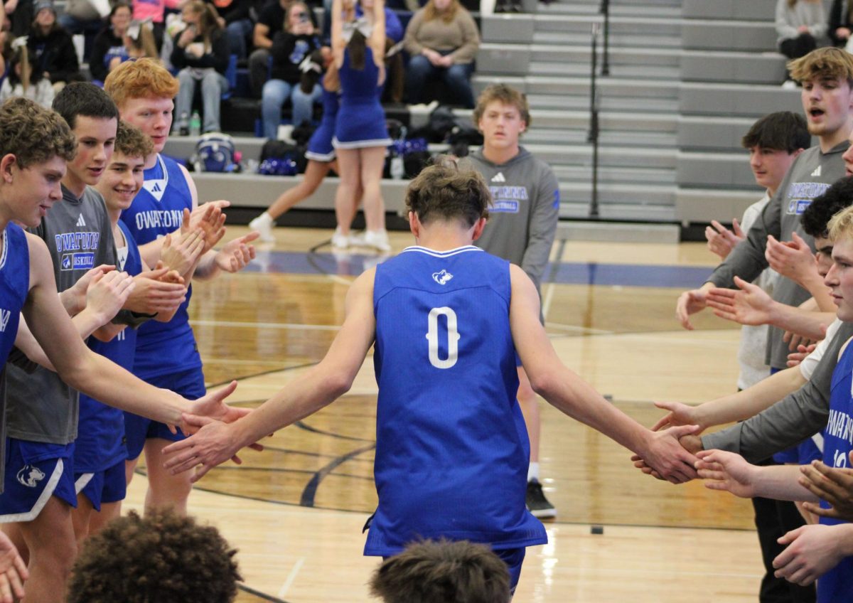 Sophomore Cooper Routh is introduced in the Boys' Basketball game against Rochester Mayo