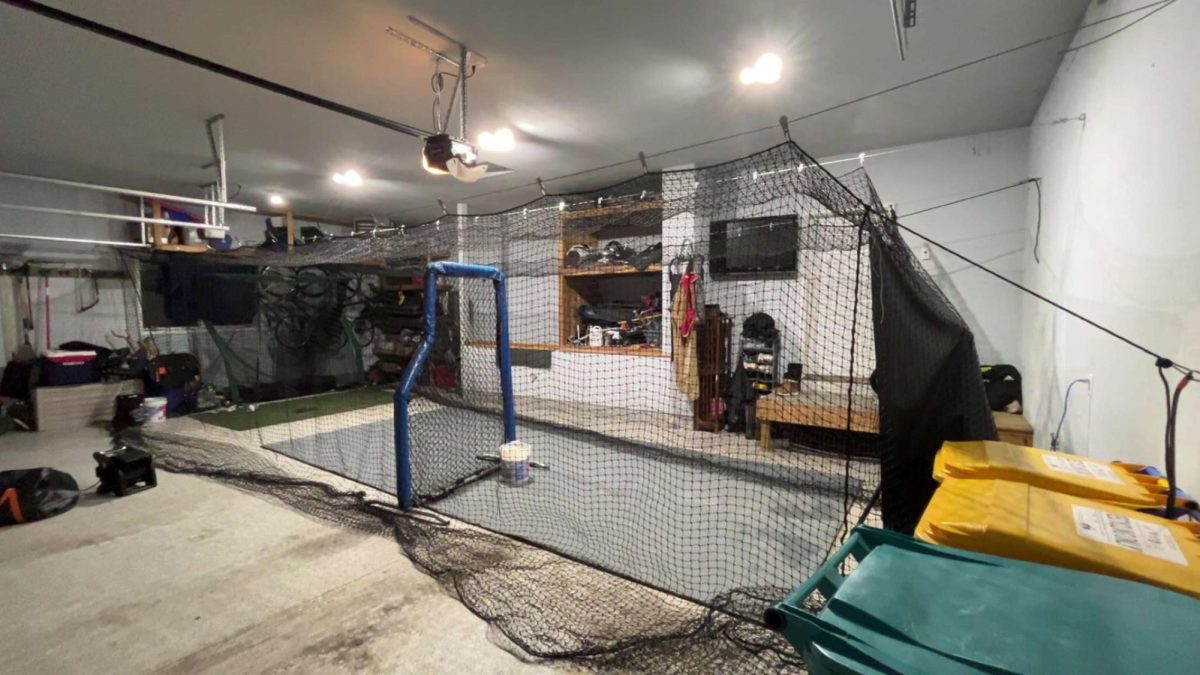 Rolloff's batting cage in his garage, where he spends hours perfecting his skills