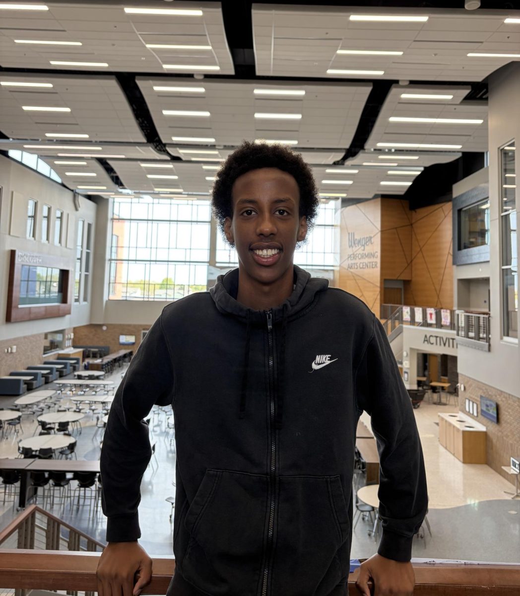 Sudeysi Ismail a junior at OHS smiles in the hall after sharing his week’s highlight. 
